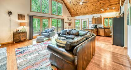 Waterfront cabin with private dock, hot tub, sundeck, outdoor areas, & W/D