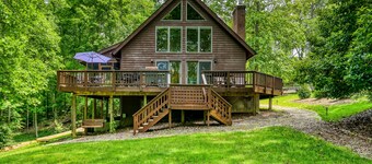 Waterfront cabin with private dock, hot tub, sundeck, outdoor areas, & W/D