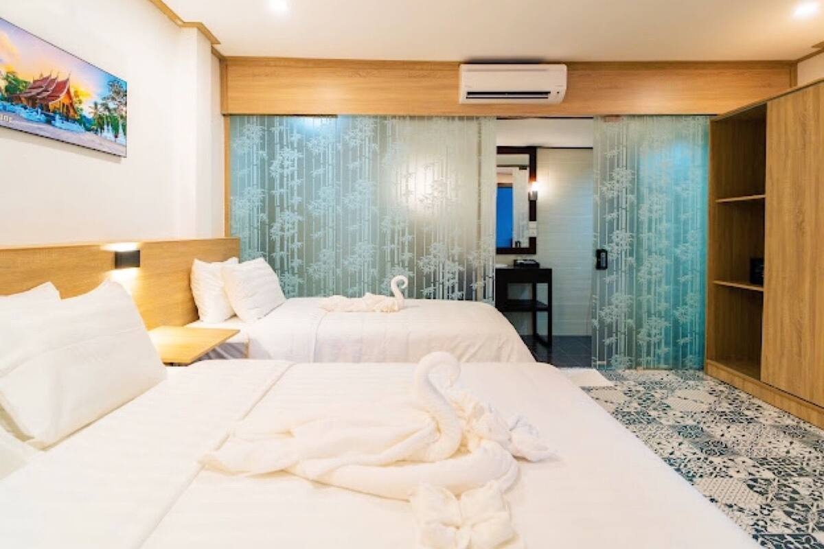 Kamar Keluarga | Seprai katun Mesir, seprai premium, minibar, dan brankas