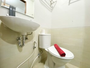 Departamento | Baño | Regadera y toallas 