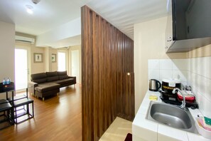 Apartamento | Cozinha privada | Geladeira grande, cooktop, panela elétrica de arroz