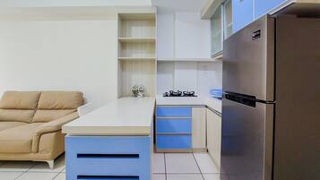 Departamento | Cocina privada | Refrigerador con congelador y parrilla de estufa