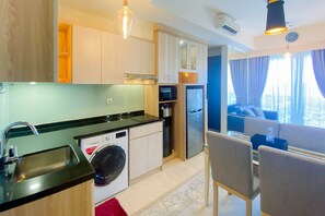 Apartment | Private kitchen | Full-sized fridge, stovetop, rice cooker, cookware/dishes/utensils - Nice And Elegant 2Br At Menteng Park Apartment (Jakarta)