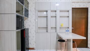 Apartment | Private kitchen | Full-size fridge, stovetop, rice cooker, cookware/dishes/utensils
