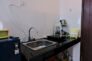 Apartamento | Cozinha privada | Geladeira grande, cooktop, panela elétrica de arroz