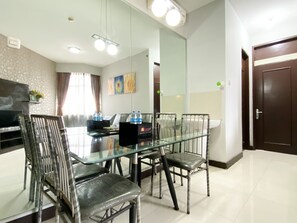 Living area - Homey 2Br Apartment Crown Court Executive Condominium (Cikarang)