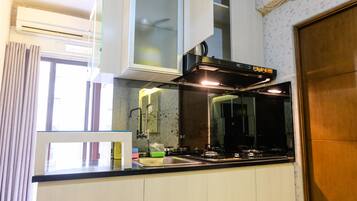 Apartamento | Cozinha privada | Geladeira grande, cooktop, panela elétrica de arroz