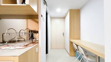 Apartment | Private kitchen | Full-size fridge, stovetop, rice cooker, cookware/dishes/utensils