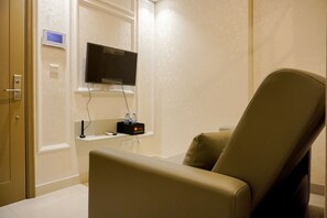 Apartment | Living area - Modern Look And Warm 1Br At Gold Coast Apartment (Jakarta)