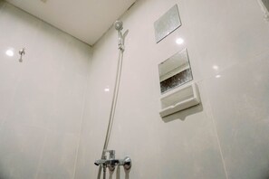 Apartment | Bathroom | Shower, towels - Minimalist And Best Deal Studio At Serpong Garden Apartment (Cisauk)
