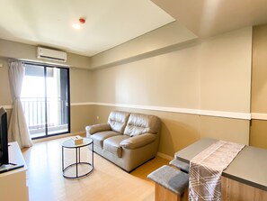 Apartment | Living area - Comfort Stay And Simply 2Br At Meikarta Apartment (Cikarang)