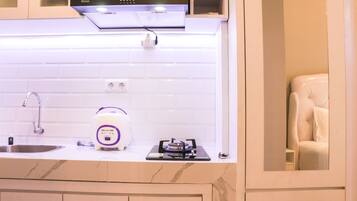 Apartamento | Cozinha privada | Geladeira grande, cooktop, panela elétrica de arroz