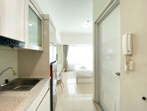 Apartment | Living area - Restful And Simply Studio Springlake Summarecon Bekasi Apartment (Bekasi)