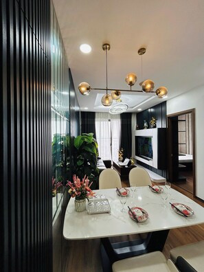 Luxury Apartment | Living area | Flat-screen TV, fireplace