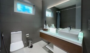 Combined shower/tub, hair dryer, slippers, bidet