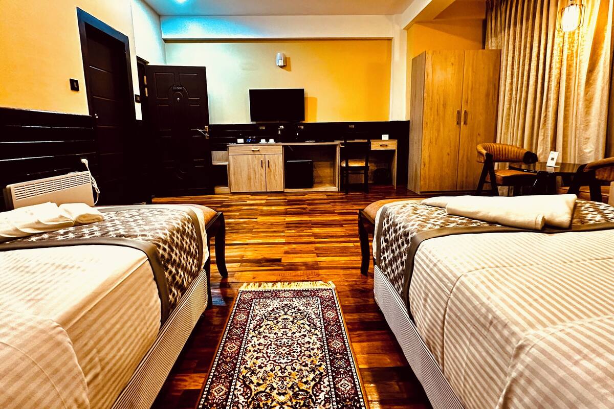 Deluxe Room, 2 Twin Beds, Mountain View | Memory foam beds, minibar, in-room safe, desk