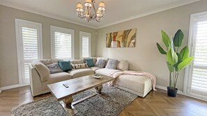 Elite Villa | Living area | 65-inch Smart TV with cable channels, TV