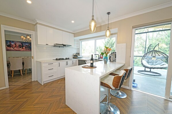 Elite Villa | Private kitchen | Full-size fridge, microwave, oven, stovetop