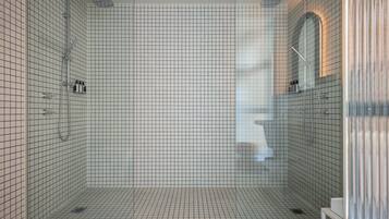 Un baño moderno con suelo y paredes de diseño tipo rejilla, una cabina de ducha de vidrio y un lavabo blanco con espejo.