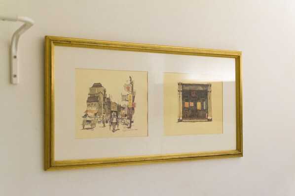 Two framed artworks on a wall. - Hotel Uptown Chinatown (Kuala Lumpur)