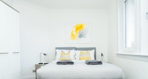 2 dormitorios, tabla de planchar con plancha, wifi gratis y ropa de cama