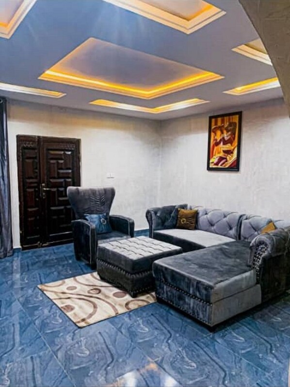 Chambre avec lits jumeaux | Coin séjour