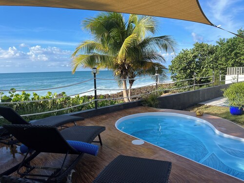 Ocean front home with 3 suites, salt water pool, gated and Wifi. Gas BBQ grill.