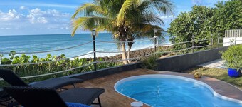 Ocean front home with 3 suites, salt water pool, gated and Wifi. Gas BBQ grill. 