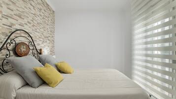 3 slaapkamers, een strijkplank/strijkijzer, gratis wifi, beddengoed