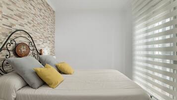 3 dormitorios, tabla de planchar con plancha, wifi gratis y ropa de cama