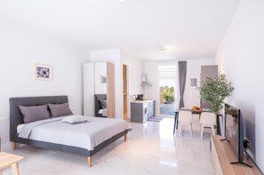 1 dormitorio, tabla de planchar con plancha, wifi gratis y ropa de cama