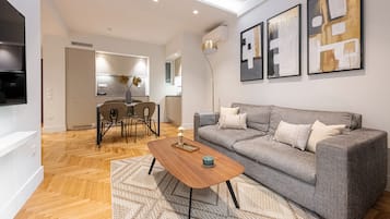 Executive Apartment | Living area | 42-inch Smart TV with digital channels, TV