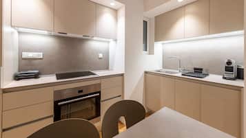 Executive Apartment | Private kitchen | Full-size fridge, oven, espresso maker, electric kettle