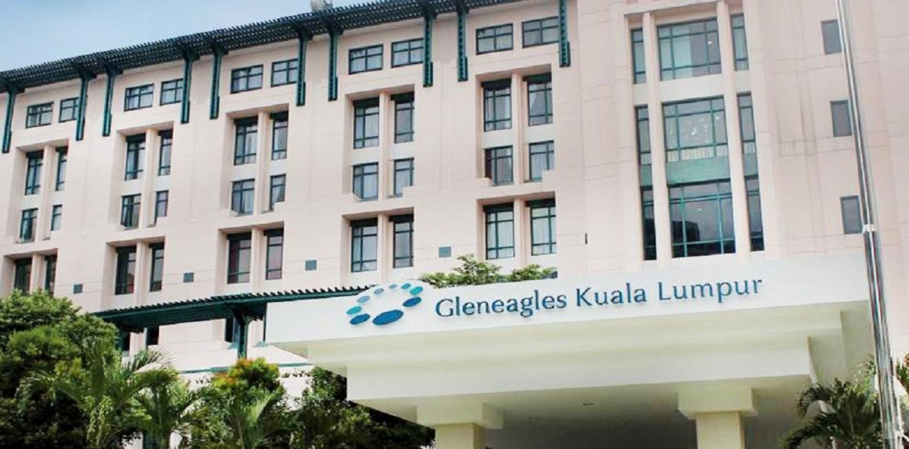 A multi-story building with a sign reading "Gleneagles Kuala Lumpur".