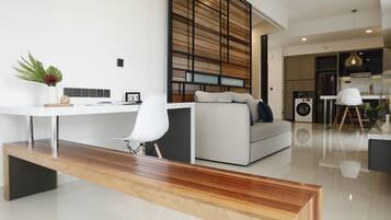 Deluxe Apartment | Living area | 32-inch LCD TV with digital channels, Netflix, streaming services