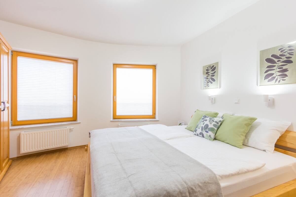 Premium bedding, desk, laptop workspace, free WiFi