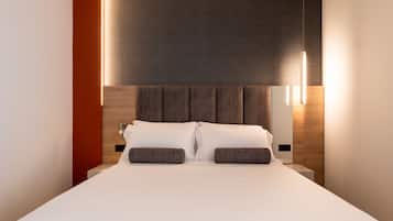 1 dormitorio, edredones de plumas, minibar y caja fuerte
