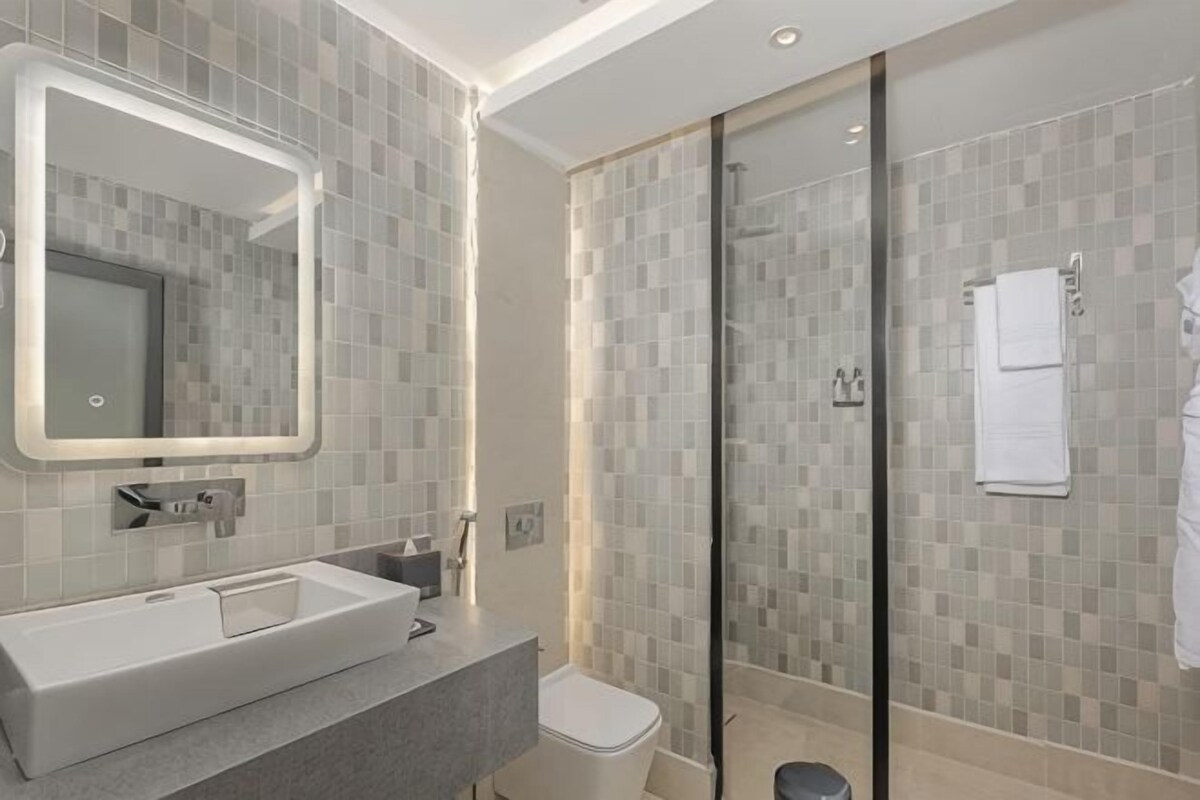 Bathroom | Shower, free toiletries, hair dryer, bathrobes