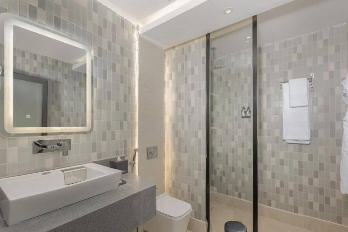Bathroom | Shower, free toiletries, hair dryer, bathrobes