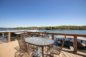 The outdoor deck is not only perfect for outdoor gatherings but also unwinding with a breathtaking view. - Ultimate Waterfront Getaway, Amazing Lake View (Climax Springs)