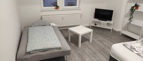 2 bedrooms, travel crib, free WiFi, bed sheets