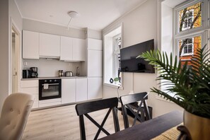 Family Apartment, 3 Bedrooms, Ground Floor | Living area | Flat-screen TV - Meltzers Apartment  (Bergen)