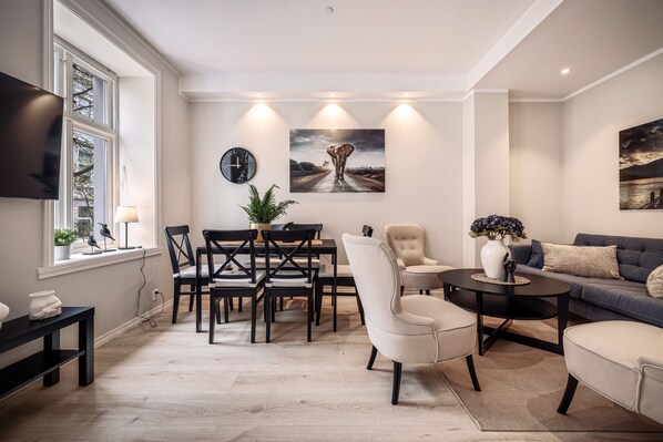 Family Apartment, 3 Bedrooms, Ground Floor | Living area | Flat-screen TV