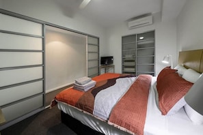 Departamento ejecutivo | 1 habitación, escritorio y espacio para trabajar con laptop 