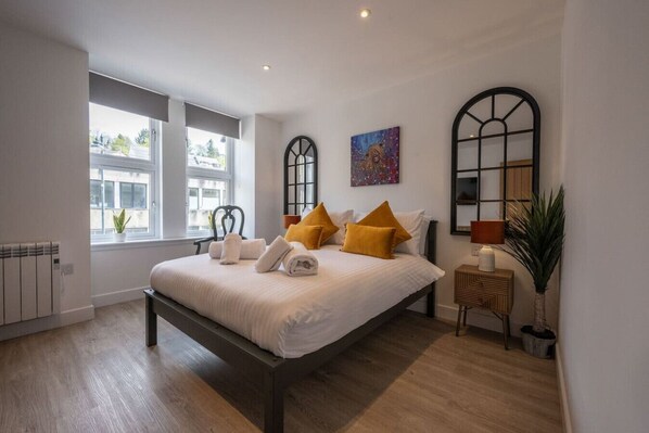 2 dormitorios, tabla de planchar con plancha, wifi y ropa de cama