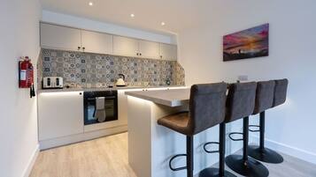 Microwave, oven, toaster, cookware/dishes/utensils