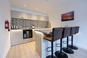 Microwave, oven, toaster, cookware/dishes/utensils