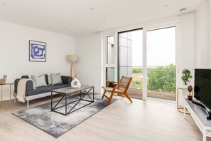 Apartment | Living area | 37-inch TV with cable channels, Netflix, streaming services