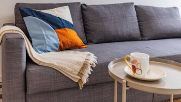 Comfort House | Living area | Flat-screen TV