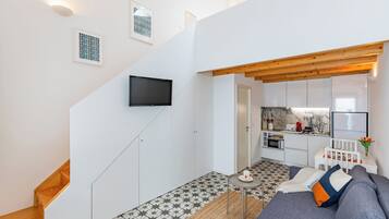 Comfort House | Living area | Flat-screen TV